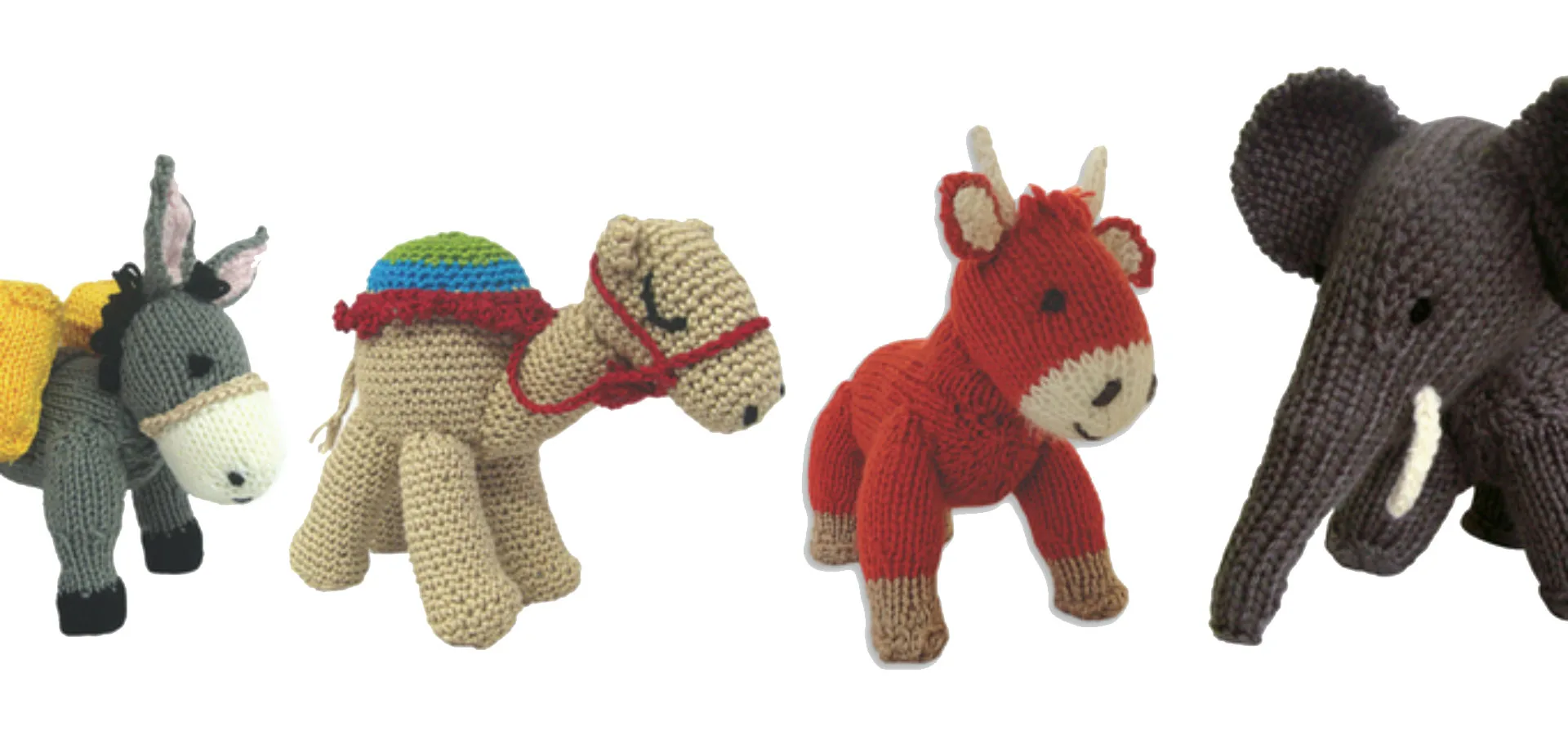 Animal knit toys on white background