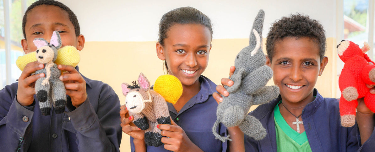 Children with knitted crocheted animals ethiopia