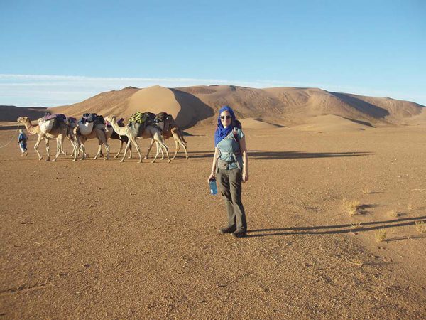 Woman standing in desert
