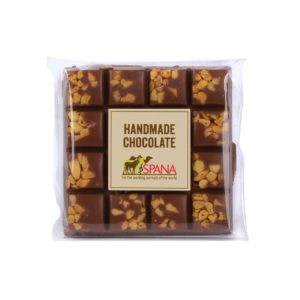 Milk chocolate square with pieces of honeycomb