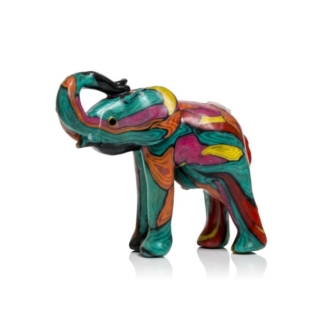 Image of an elephant shaped candle in a green, orange, pink and yellow African patterned design