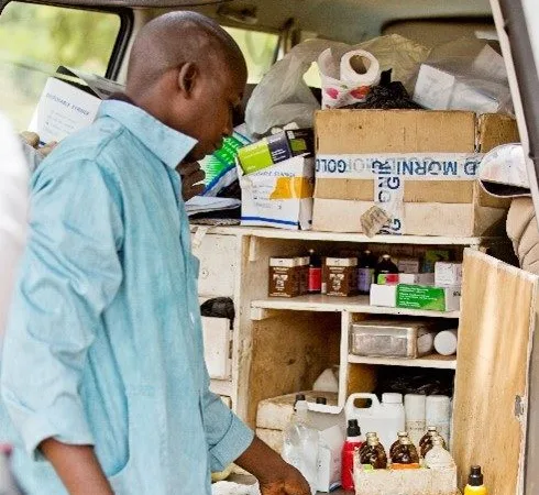 Mali mobile vet clinic for working animals showing the vans equipment with a SPANA vet showing what is stocked in the van.