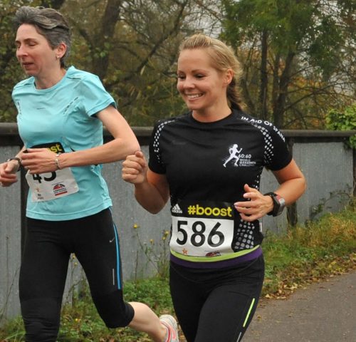 Two women running