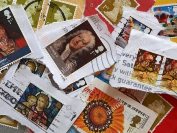 Pile of first and second class stamps which can be donated to SPANA