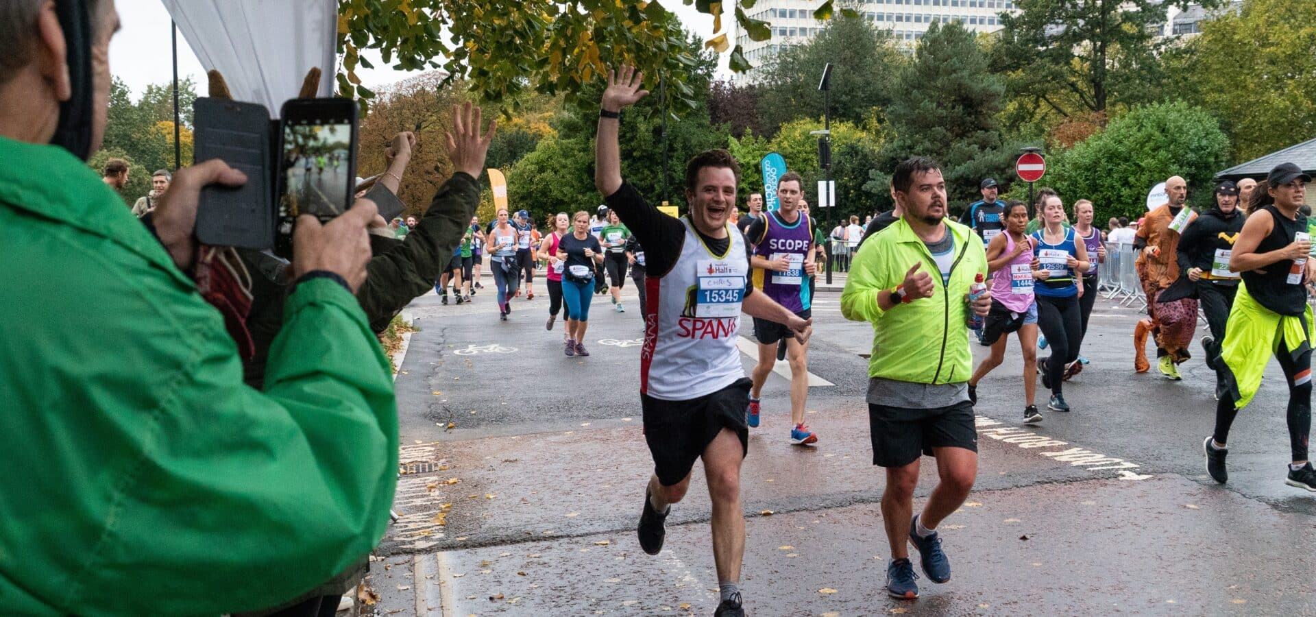 Man enthusiastically running the Royal Parks Half Marathon for SPANA