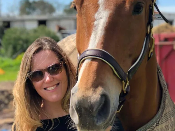 SPANA Trustee Morgan Lance with a brown horse